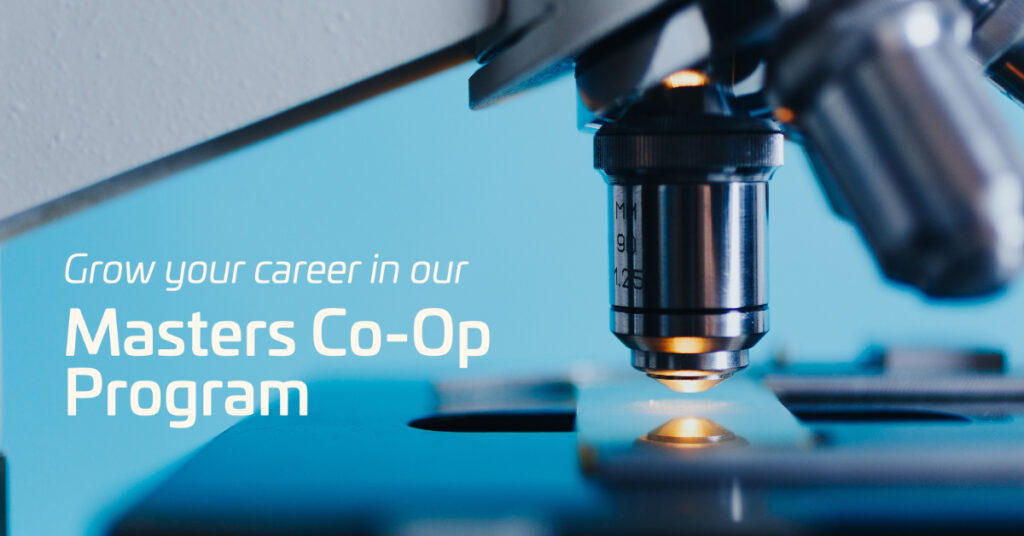 close up image of light microscope lens and slide stand.